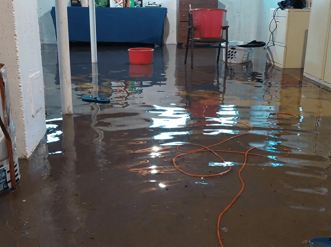 Basement with boiler, cabinets and washing machine completely flooded in Irvine, CA